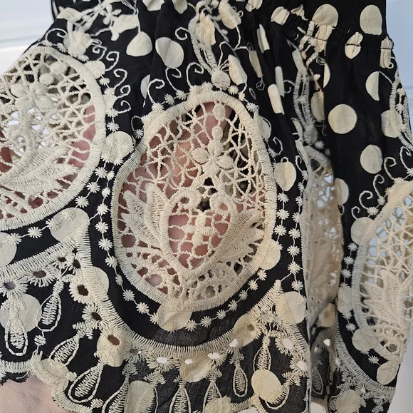 Free people top size XS. Black w cream Polkadots.          A - Picture 5 of 6